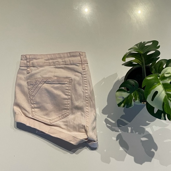Pale pink jean shorts with small pocket details. Size 27. - Picture 2 of 3